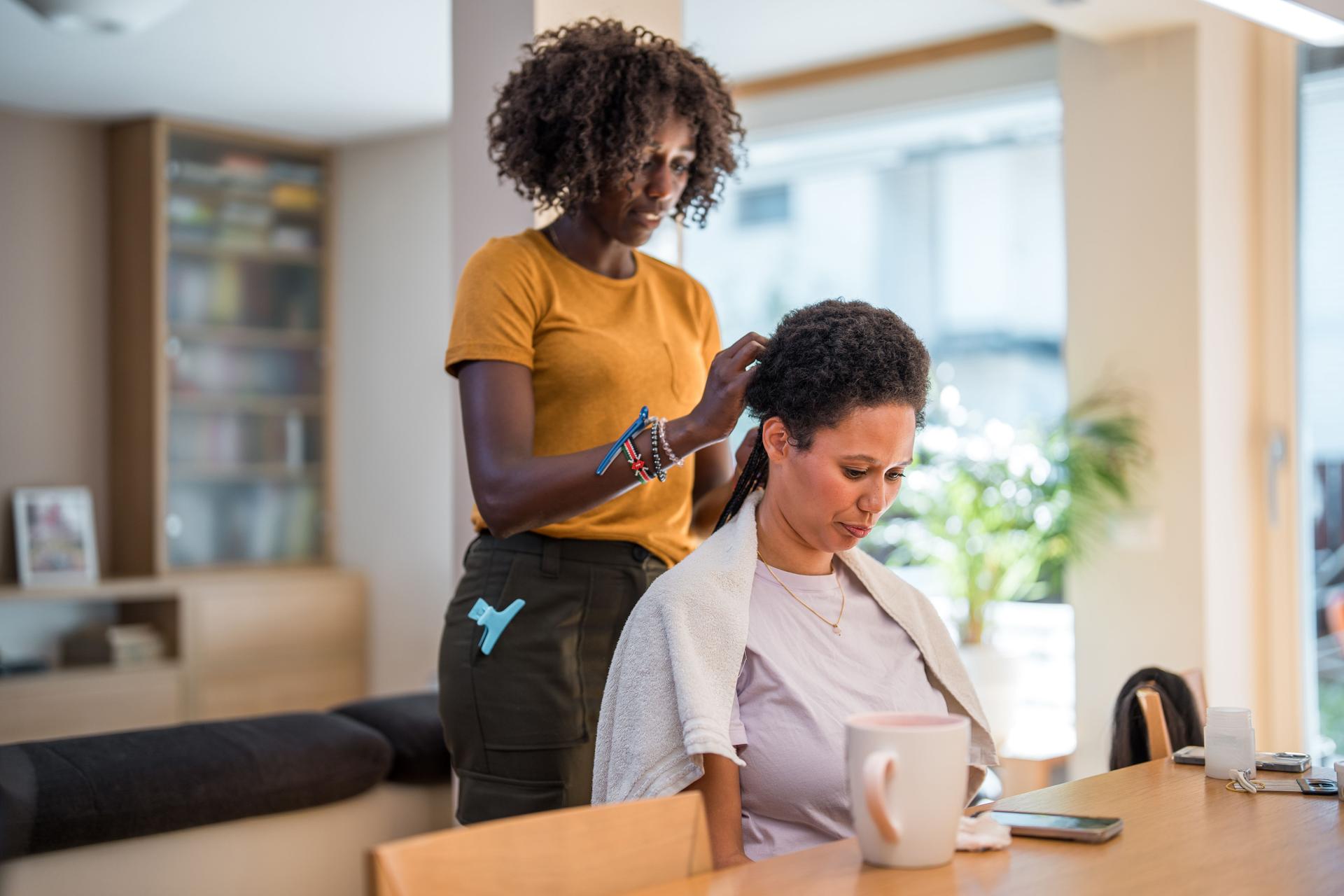 Home Hair Braiding by Mixed Race Female on Mid Adult Black Female